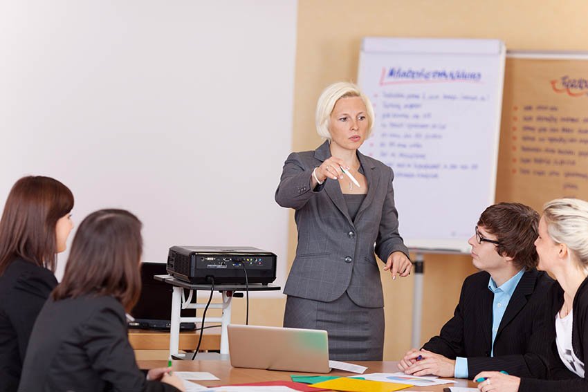 woman making a public speaking presentation