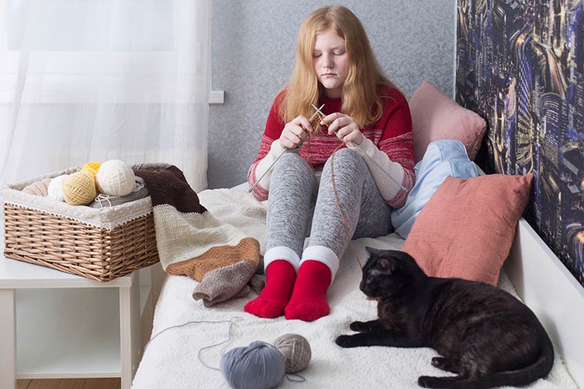 teen girl knitting as an entrepreneur