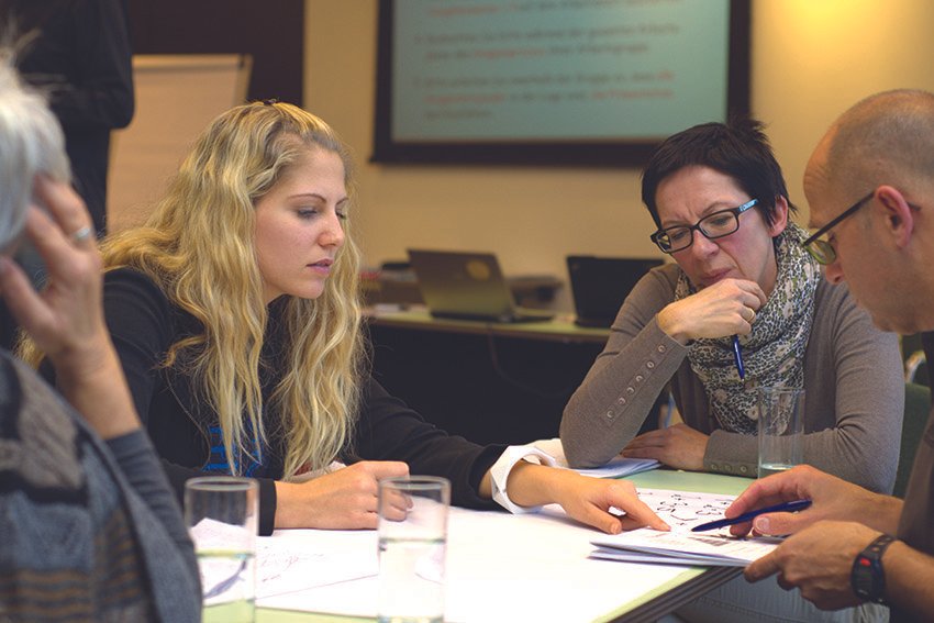 a small business support network meets together